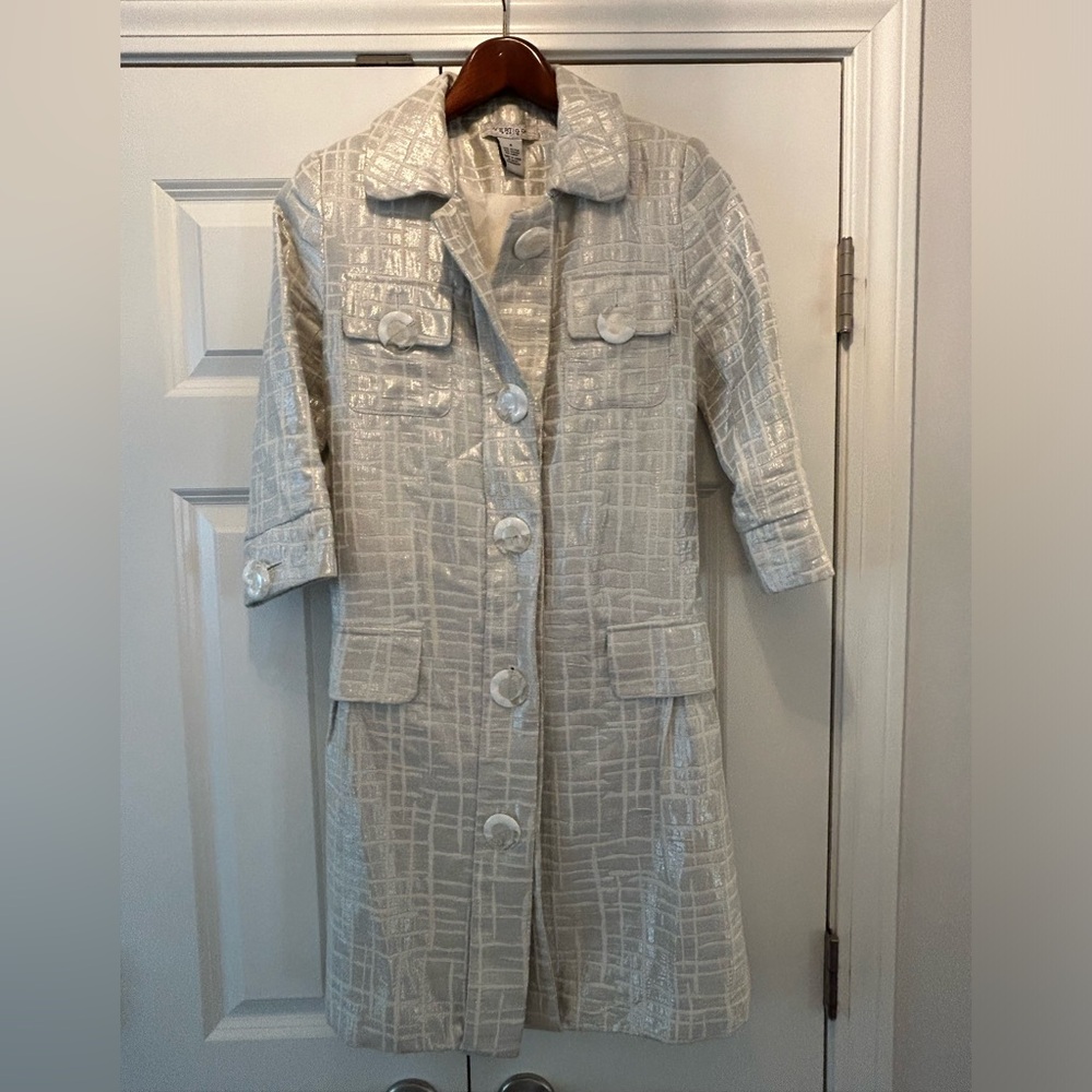 Vertigo Jacket with belt and 3/4 length sleeves.